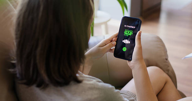 istock Adolescence girl asking AI Chatbot mobile app questions using her smart phone 2221707595