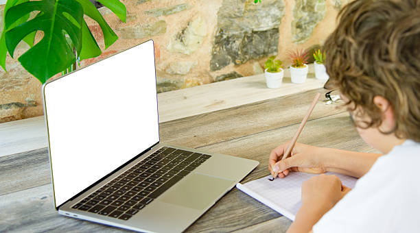istock Kid Studying at Home with Laptop – Online Learning Concept 2221712052