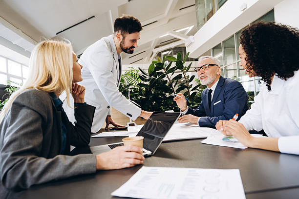 istock Business people working together on a project using laptop in the office 2221723228