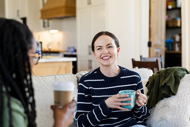 istock Two Women Enjoying Coffee and Conversation at Home 2221738290
