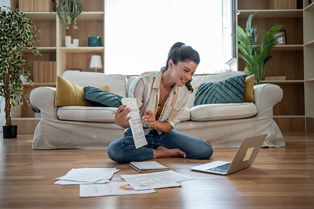 istock Young woman working remotely from home having a video call 2221743130