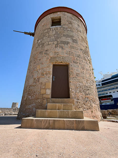 istock Old round stone tower with door 2221748181