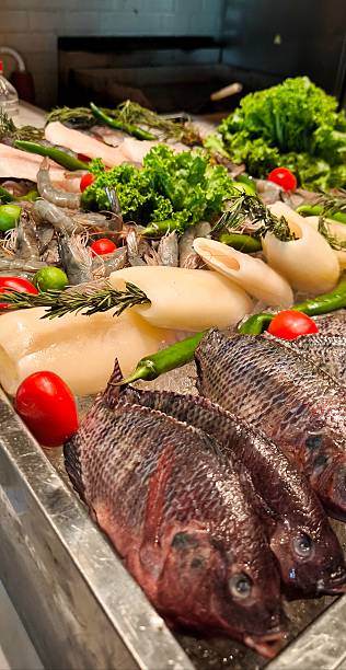 Fresh seafood and fish on ice: assortment for Mediterranean cuisine