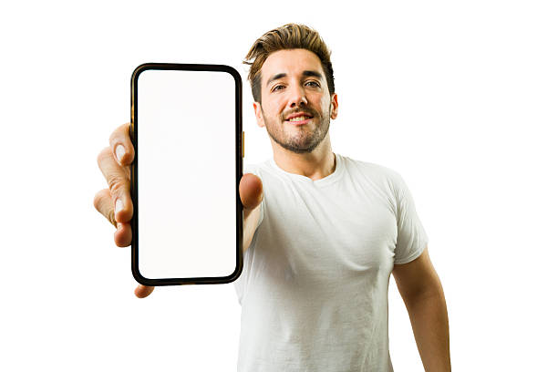 istock Young man showing smartphone with blank screen in studio 2221769332