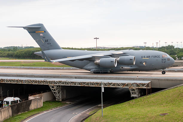 United States Air Force Boeing C-17 Globemaster III taxiing on the runway at Rio de Janeiro International Airport during a military operation. November 18, 2024.
