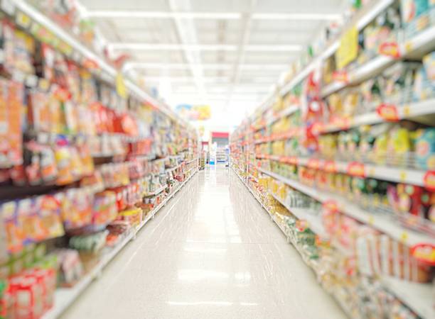 istock Blurred background image of shelves, shopping aisle 2221772705
