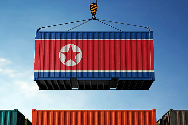 istock North Korea trade cargo container hanging against clouds background 2221772938
