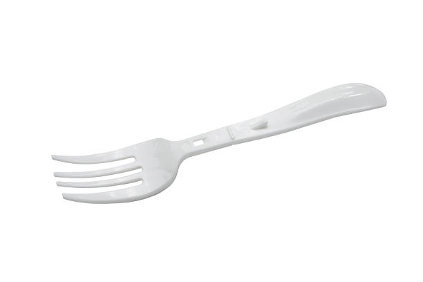 istock White plastic fork for cup noodles isolated on white background 2221773657