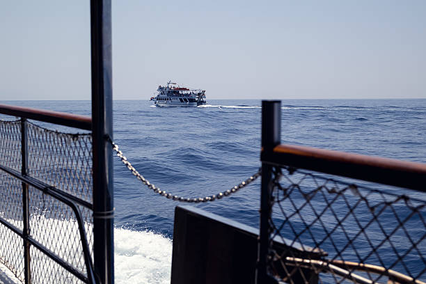 Boat Cruising on Open Water on a Sunny Day