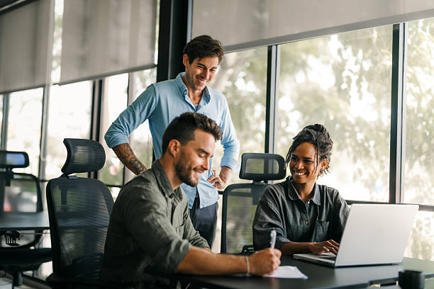 istock Diverse startup, business people working together on laptop computer in modern office 2221805188