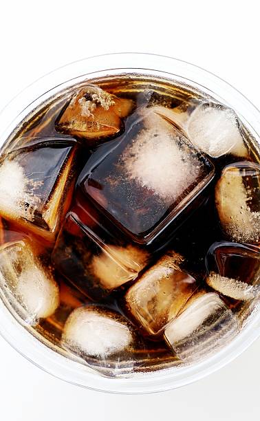 Cola Soft Drink and Ice cubes - Cold beverage.