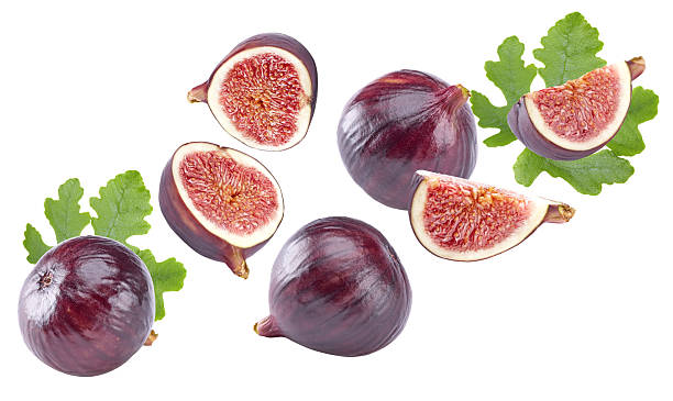 istock Fig fruit with green leaves isolated on white background. clipping path 2221806880