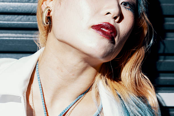 istock Lower face of woman looking at the camera 2221808958