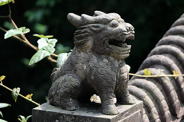 Small statue's close-up at Mount Qingcheng scenic area, a sacred Taoist mountain in Dujiangyan, Chengdu, Sichuan, China.