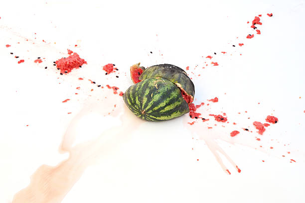 Close-up of a broken watermelon isolated on a white background.