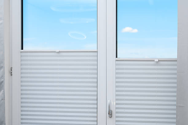 istock isolated balcony window with a view covered with gray pleats 2221810814