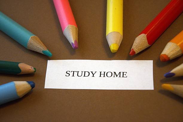 istock Study home subtitle or text on paper with colorful pencils and copy space. 2221812047