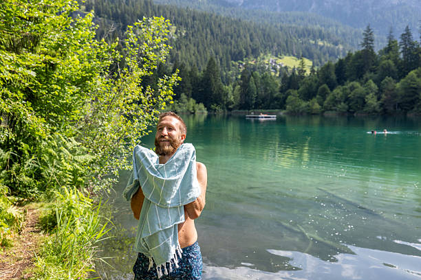 Small alpine Lake Laux among mountains in Piedmont, Northern Italy.