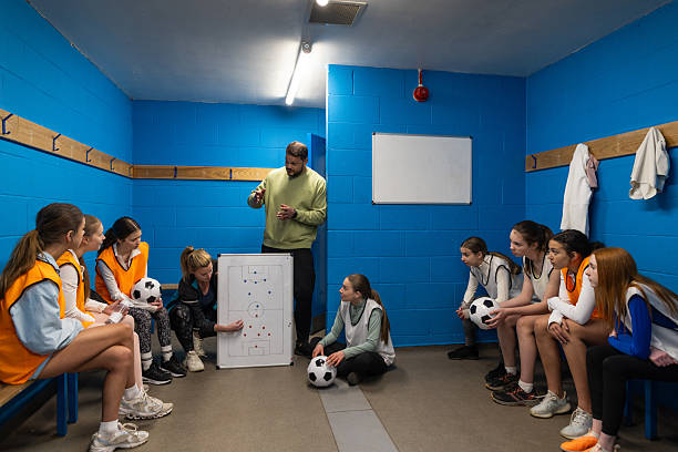 istock Discussing Tactics in the Changing Rooms 2221815197
