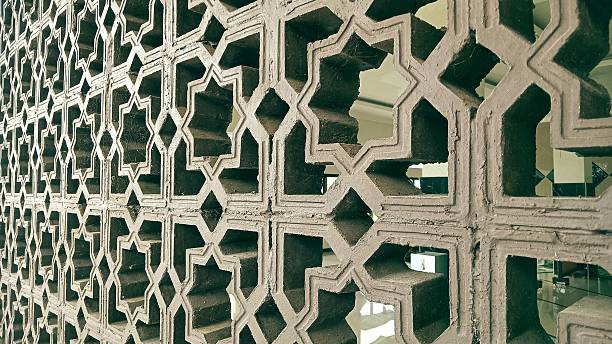 istock Islamic inspired patterns adorn concrete wall, showcasing intricate design. 2221817649