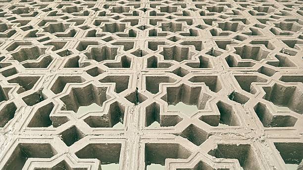 Islamic inspired concrete pattern in the shape of stars.