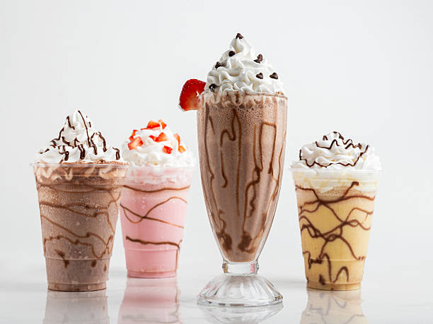istock Four tempting milkshake variations: chocolate, strawberry, vanilla, and a mocha blend 2221818938