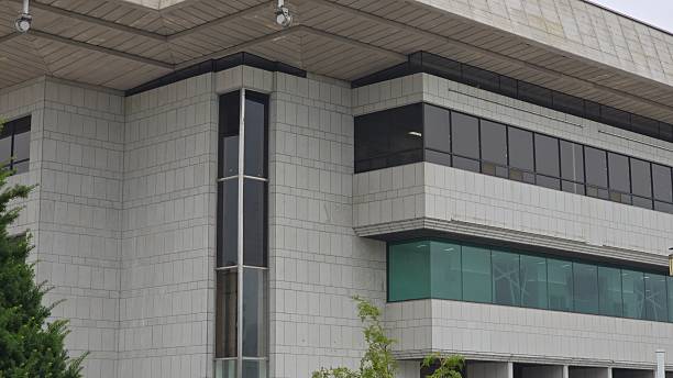 istock Modern Institutional Building with Tiled Facade and Linear Windows 2221820762
