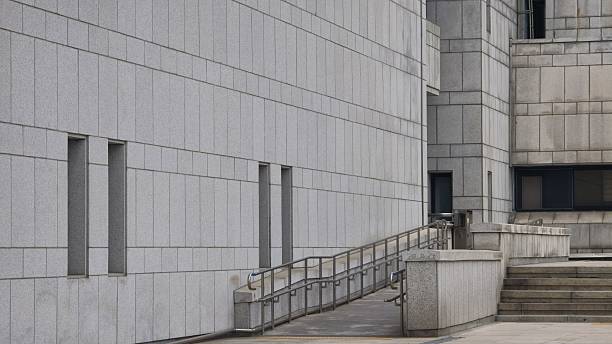 Modern Tiled Public Building with Ramp and Geometric Facade