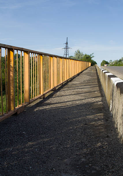 istock A wooden fence on a dirt road 2221828202