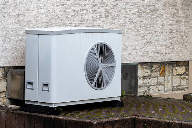 istock Outdoor air conditioning unit placed by a building 2221829748