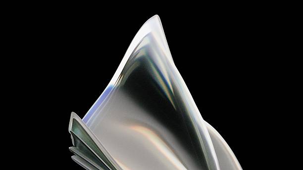 istock 3D Abstract shimmering form evokes a sense of ethereal grace against a black backdrop, clean style. 2221832397