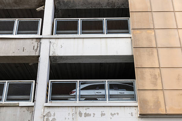 exterior of parking garage with car inside