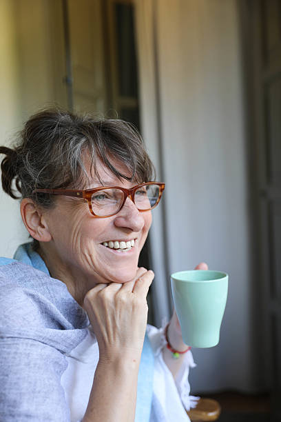 istock Thoughtful Middle-Aged Woman Enjoying Morning Coffee 2221832844