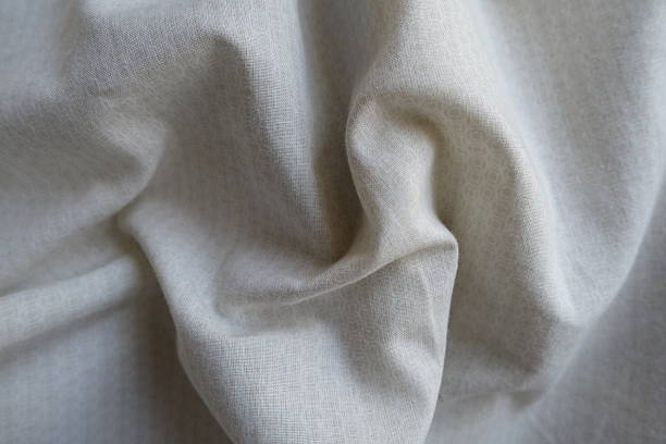 istock Creased pale beige cotton fabric with circles pattern 2221840589