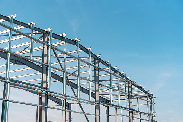 istock Construction process of new industrial building warehouse structure made of steel frame 2221841822