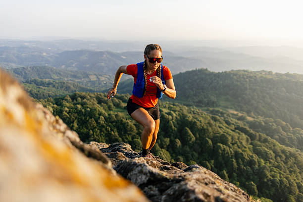 istock Woman running in the mountains 2221845660