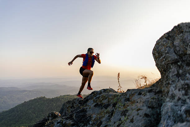 istock Woman running in the mountains 2221845712