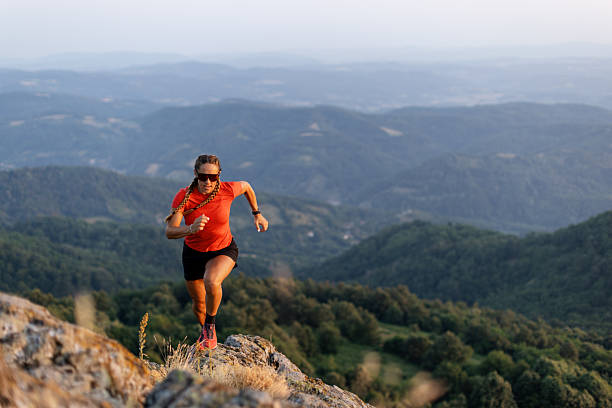 istock Woman running in the mountains 2221845729