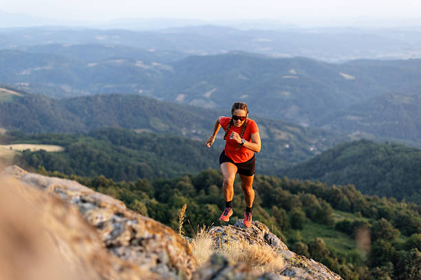 istock Woman running in the mountains 2221845735