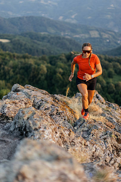 istock Woman running in the mountains 2221845746