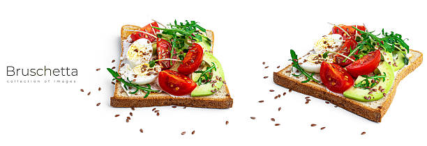 istock Bruschetta with fried egg and vegetables on a white background. 2221849505