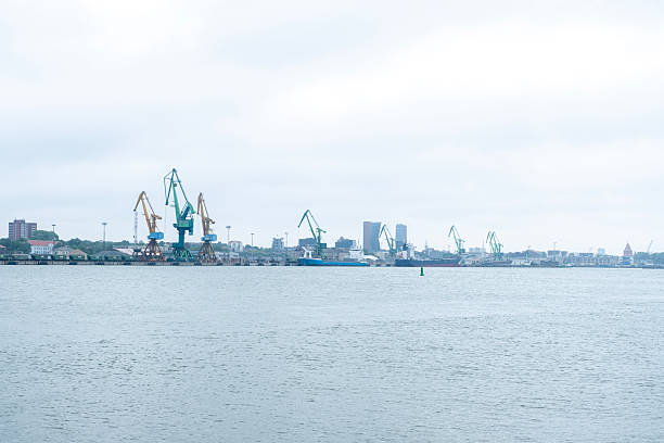 Cranes and loading area at the commercial port in Klaipeda, Lithuania
