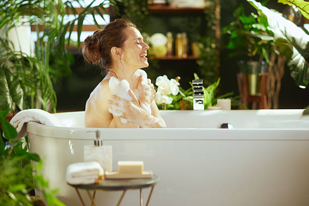istock Happy Self-Care Scrub in a Bright Bubble Bath 2221854094