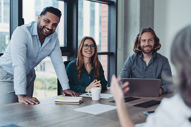 istock Group of business persons making a presentation 2221863383