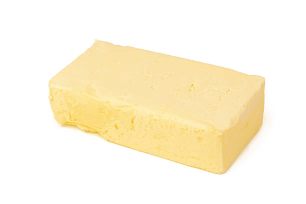 istock Block of butter isolated on white background 2221864431