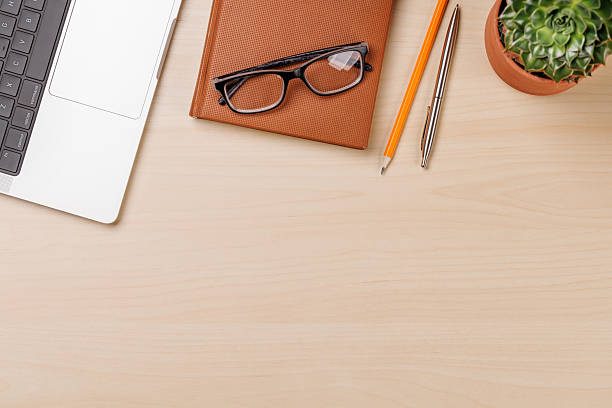 istock A clean and minimal desk setup featuring a laptop and a office supplies 2221864765