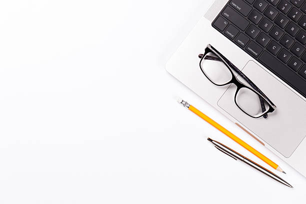 istock A clean and minimal desk setup featuring a laptop and a office supplies 2221864795