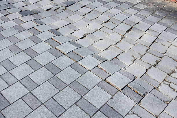 istock A photo of a brick road. Some are broken. 2221866832