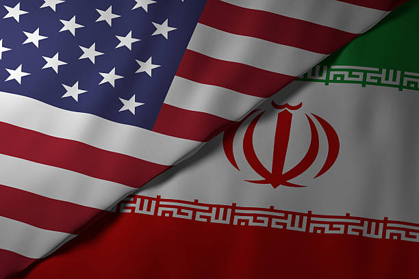 istock Overlapping USA and Iran flags symbolizing diplomatic tensions 2221876243