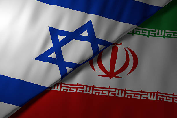istock Overlapping Israel and Iran flags representing conflict and diplomacy 2221876248